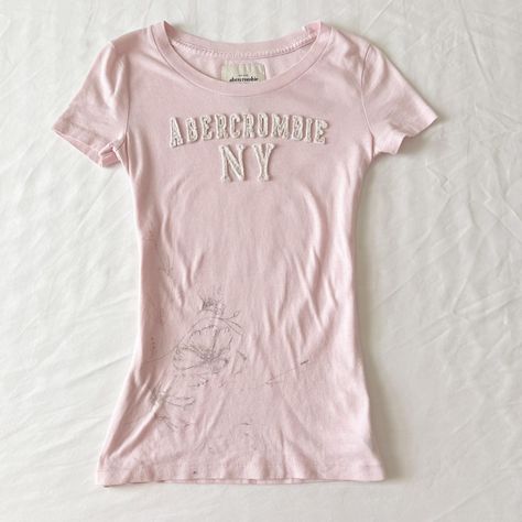 Y2k Abercrombie baby pink baby tee with floral... - Depop Depop Keywords, 2000s Abercrombie, Pink Baby Tee, Iconic Prints, Y2k Abercrombie, Floral Sketch, Baby Tees Y2k, Y2k Baby Tee, Baby Tees