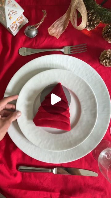 Manuela Mazzocco on Instagram: "✨Christmas Tree Napkin Fold✨ One more way to showcase the magic of the season❤️ This simple yet enchanting fold can add a sprinkle of joy to your holiday celebrations😘 Merry Christmas 🎄  #napkinfold #tutorial #howto #napkin #tabledecor #holidaytable" Napkin Folded Like Christmas Tree, Napkin Christmas Tree Folding, Christmas Tree Napkin Folding Tutorials, Fold Napkin Like Christmas Tree, Easy Christmas Napkin Folding, Fancy Napkin Folding Tutorials, Christmas Folding Napkins, Winter Napkin Folding Ideas, Xmas Napkins Ideas