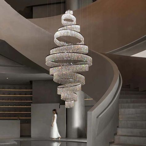 If you are looking for a luxurious and impressive statement piece, look no further. This eye-catching chandelier is perfect for anyone who wants to make a bold statement with their décor. With its intricate design and dazzling crystals, this chandelier is sure to impress. Whether you are looking to add some glamor to your hallway or want to make a dramatic impact in your foyer, this chandelier is a perfect choice. Warranty: 2 years Voltage: 90-260V Switch Type: Remote Control Style: Modern Shade Bottles Chandelier, Extra Large Living Room, Living Room Staircase, Entry Chandelier, Crystal Chandelier Living Room, High Ceiling Lighting, Diy Lights, Luxury Staircase, Led Crystal Chandelier