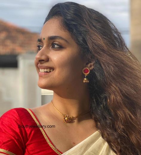 Keerthy Suresh in a simple gold choker and jhumkas Gold Simple Chain, Simple Choker Necklace, Keerthy Suresh, Simple Choker, Gold Jewelry Outfits, Choker Necklace Designs, Black Beads Mangalsutra Design, Choker Designs, Antique Gold Jewelry Indian