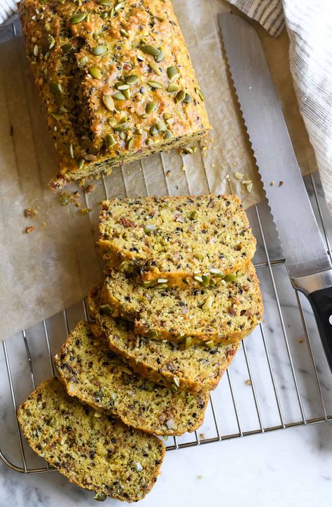 This grain free bread is hearty and chewy with an abundance of flavor from seeds and nuts. It's a high protein low carb bread with 10 grams of protein in each slice. Top it with almond butter, jam or avocado for a healthy grain free, paleo breakfast. Low Glycemic Bread, Sugar Free Bread, Tigernut Flour, Grain Free Bread, Almond Seed, Plant Based Recipes Breakfast, No Yeast Bread, Protein Bread, Yeast Breads