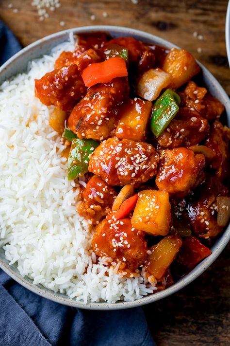 Homemade crispy sweet and sour chicken with a better-than-takeout sauce made from store cupboard ingredients! Ready in 25 minutes. #sweetandsour #sweetandsourchicken #chinese #chinesechicken #betterthantakeout #fakeaway #streetfood Recipes With Rice Vinegar, Chicken Recipe With Rice, Crispy Sweet And Sour Chicken, Recipe With Rice, Sweet And Sour Chicken Recipe, Sour Chicken Recipe, Kitchen Sanctuary, Homemade Chinese Food, Cream Chicken