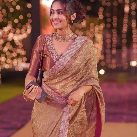 Revamp your wardrobe with the latest crush tissue silk saree in a stunning goldish brown hue, taking inspiration from the iconic style of Reba John Mam. To book your order kindly DM or WhatsApp on +91 8960513156 #crushtissue #banarasisaree #rebajohn #celebrity #designersarees #indianfashion Long Blouse Designs, Bridal Sarees South Indian, Simple Saree Designs, Bridesmaid Saree, Fashionable Saree Blouse Designs, Fancy Sarees Party Wear, Indian Saree Blouses Designs, Half Saree Designs, Kalamkari Saree