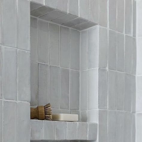 Riad Tile on Instagram: "We get asked all the time about how to trim Zellige tiles.  Here is a perfect example of a shower niche with mitered corners so that the tile seamlessly wraps into the niche.  Tile used is our 2x6 Snow Zellige⁠ ⁠ Repost from @arborhomesupply⁠ Excited to share this gorgeous shower by @oakstonehomesiowa⁠ #riadtile #zellige #zelligetrim #zelligtile #zelligesnow26riadtile #dreamshower" Zellige Tile Shower Niche, Tile Shower Shaving Ledge, Schluter Tile Edge Shower Niche, Zellige Tile Edge, Zellige Tile Bathtub Surround, Zellige Tub Surround, Tile Shower Niche, Dream Shower, Loft Bathroom