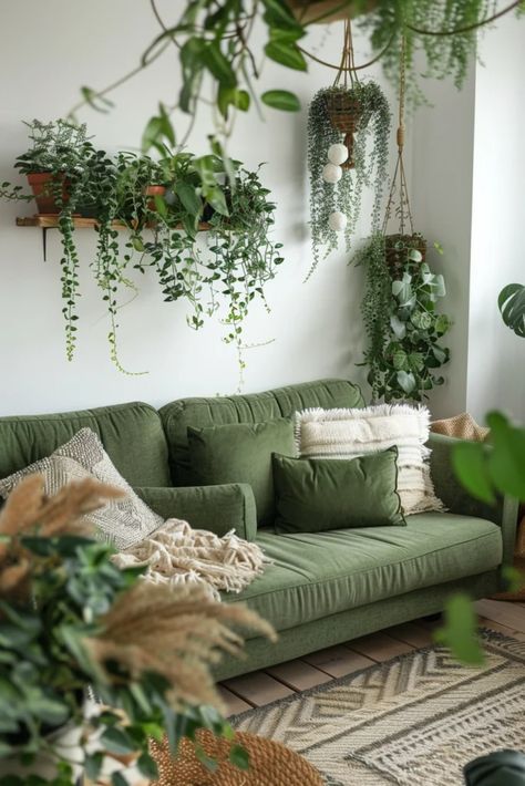 Plants On Green Wall, Plant Sitting Room Aesthetic, Plants Over Couch, Earthy Bedrooms, Jungle Living Room, Decor Above Tv, Minimalist Boho Living Room, Wall Plants Indoor, Jungle Aesthetic