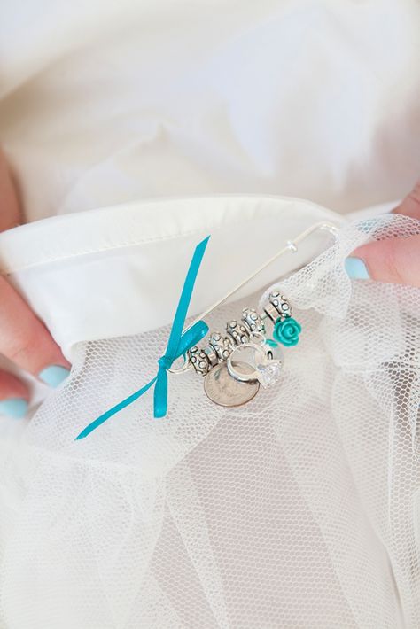 I like how she used one of her grandma's old earrings. Everyone has a loose, odd earring around! Kilt Pin Jewelry, Something Borrowed Wedding, Old Earrings, Father Of The Bride Outfit, Old New Borrowed Blue, Wedding Garter Blue, Something Old Something New, Turquoise Wedding, Blue Bouquet