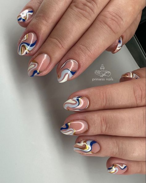 Shades of blue and gold metallic blend together in intricate, abstract swirl designs Blue And Gold Swirl Nails, Shades Of Blue Nail Designs, Grad Nails, Swirl Nail, Future Nails, Swirl Nail Art, Short Almond Nails, Gold Nail Art, Cute Simple Nails