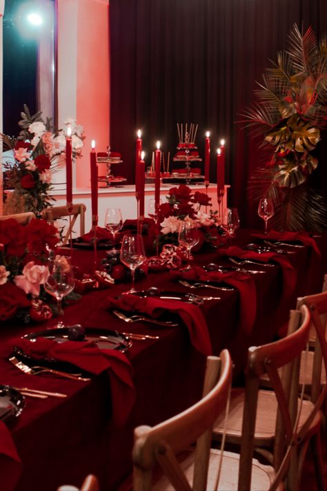 Red is the ultimate cure for sadness. Black And Red Dinner Table, Red Theme Table Setting, Red Velvet Table Cloth, All Red Table Setting, Red Wine Party Decorations, Dark Red Table Setting, All Red Party Theme, Red Table Scape, Red Dinner Party