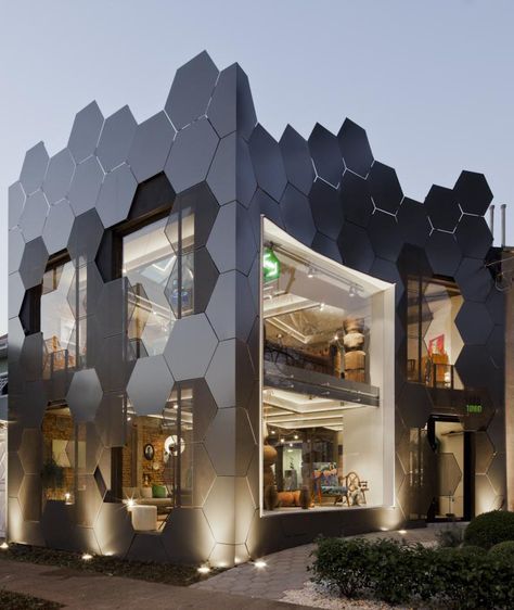 This honeycomb inspired facade, full of hexagonal shapes, was created for the… Display Visual Merchandising, Architecture Cool, Interior Vintage, American Architecture, Architecture Design Concept, Shop Window Design, Shop Front Design, Design Exterior, Facade Design