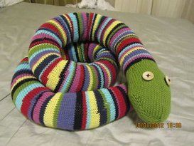 Enormous Stripey Knitted Snake: 4 Steps (with Pictures) Knitted Snake, Gruffalo's Child, Knitting Abbreviations, Sewing Stuffed Animals, Knitting Patterns Toys, Knitted Animals, Snake Patterns, Knit In The Round, Free Knitting Pattern