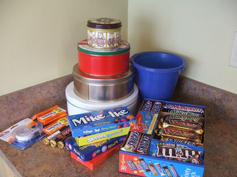 making candy cakes | Easy to Make, No Bake, Extreme Candy Bar Cake | Detroit Mommy Bloggers Candy Bar Cake, Bar Cake, Chocolate Tree, Cake Tower, Bar Signage, Money Cake, School Carnival, Candy Cakes, Cookie Tins