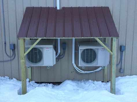 This pressure treated cover was made to deflect ice from a metal roof above. Northeast heat pumps can help with all of your protection needs Condenser Unit Cover, Heat Pump Shelter, Air Conditioner Shed, Outdoor Heat Pump Cover, Outdoor Heat Pump Covers, Air Conditioner Cover For Winter, Evaporative Cooler Vent Cover, Hvac Cover, Heat Pump Cover