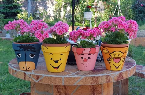 Winnie The Pooh Terra Cotta Pots, Winnie The Pooh Pots Diy, Winnie The Pooh Flower Pot, Character Flower Pots, Disney Plant Pots, Disney Flower Pots, Flower Pot Painting Ideas Creative, Garden Themes, Pot Craft