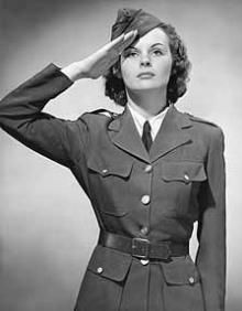 This is one of many pictures that shows when women started to be stronger and more independent. WW2 is when women started to take part in the army have harder jobs. Now in Canada women are always standing up for them selves and doing any job they want. Ww2 Fashion, Women's Military Uniform, Ww2 Women, Wwii Women, 1950s Woman, Wwii Posters, Women's Uniforms, Marlene Dietrich, 40s Fashion