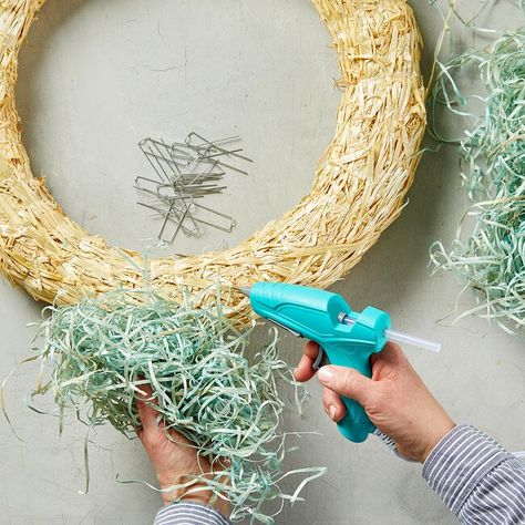 adhering-basket-grass-straw-wreath-c80d0d1d Diy Easter Egg Wreath, Easter Egg Wreath Diy, Diy Easter Wreath, Easter Egg Craft, Easter Centerpieces Diy, Easter Mesh Wreaths, Decorative Paper Napkins, Dollar Store Finds, Egg Craft