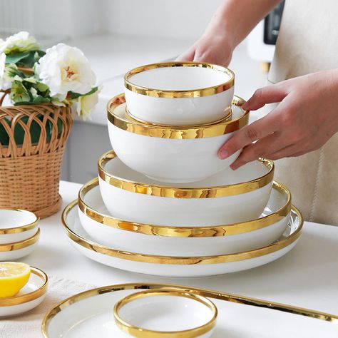 Legacy white dinnerware will add instant elegance to any table setting. Each piece is hand painted with a gold rim, making it the perfect addition to any social occasion. With their durable high quality porcelain, this set is perfect for everyday use or for entertaining at home or out on the town. Material: Fine Porcel Gold Tray Decor, Entertaining At Home, Gold Tray, Gold Dinnerware, Bowl Plate, White Dinnerware, Luxury Dinnerware, Kitchen Dinnerware, Porcelain Dinnerware