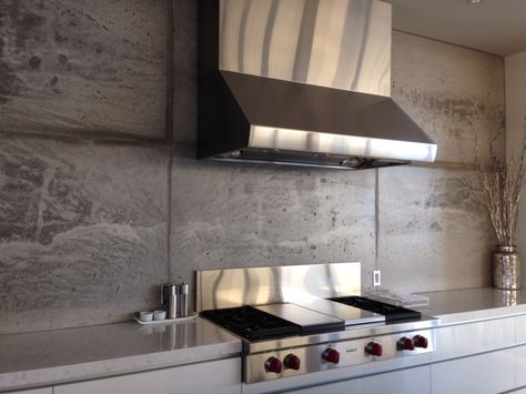 Vertically cast concrete wall panels as backsplash Concrete Backsplash Kitchen, Concrete Tile Backsplash, Concrete Tiles Kitchen, Stove Backsplash Ideas, Concrete Backsplash, Custom Wall Design, Contemporary Backsplash, Moss Walls, Concrete Wall Panels