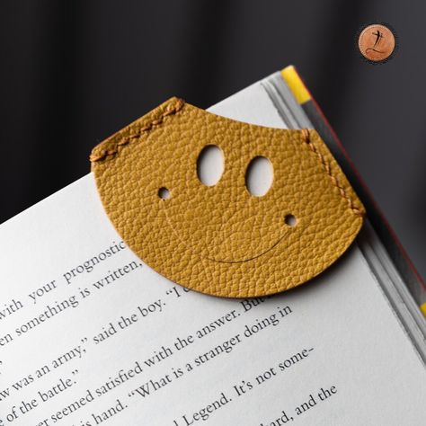 Funny Face Leather Corner Bookmark, Custom Leather Bookmark, Engraved Leather Bookmark, Handcrafted French Goat Leather, Book lovers gift | MakerPlace by Michaels Diy Leather Ornaments, Leather Corner Bookmark, Leather Crafts Diy, Stationery Store Design, Leather Bookmarks, Small Crafts, Corner Bookmark, Corner Bookmarks, Leather Diy Crafts