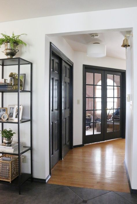 Sherwin Williams Iron Ore Black Door And Trim, Door And Trim Paint, Black Trim Interior, Jones Design Company, Dark Doors, Trim Paint, Dark Trim, Black Interior Doors, House Trim