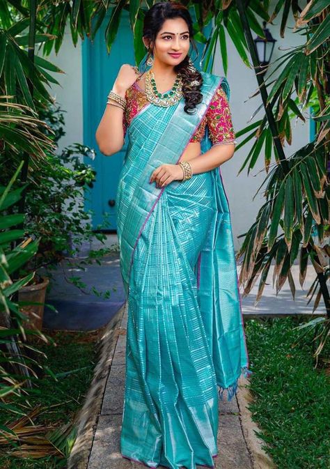 nakshatra nagesh blue silk saree and pink designer blouse Traditional Blouse Designs Indian Silk Sarees, Silk Saree Poses, Blue Silk Saree Blouse Designs, Contrast Blouses For Silk Sarees, New Silk Saree Collections, Silk Saree Look Traditional, Blue Colour Blouse Designs, Poses On Saree, Blue Saree Contrast Blouse