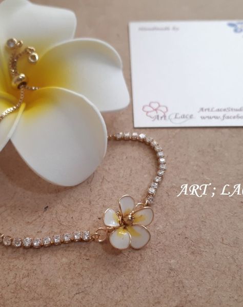 Adjustable slider crystal chain bracelet with tiny Frangipani white flower, Plumeria flower crystal chain bracelet Plumeria Bracelet, Plumeria Jewelry, Hawaiian Bracelets, Frangipani Flower, Jewelry Delicate, Bridesmaid Gifts Jewelry, Gifting Ideas, Rhinestone Chain, Bracelet Dainty