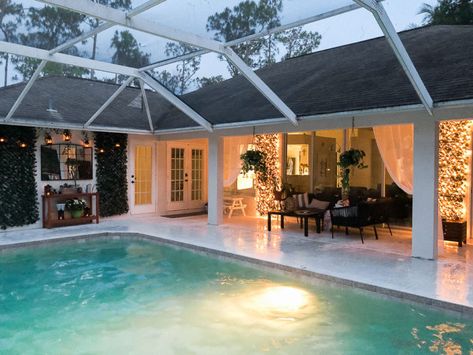 Blank patio turned plant-filled retreat | House Mix Pool Screen Lighting Ideas, Pool Lanai Lighting Ideas, Florida Pool Ideas With Cages, Florida Patio Ideas Screened Pool, Pool Cage Decor Ideas, Screened In Pool House, Back Porch Pool Ideas, Indoor Pool Decorating Ideas, Screened Pool Patio Ideas Decor