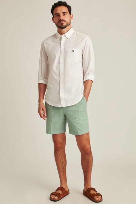 Men's light green shorts, white shirt and tan suede slider sandals outfit. This outfit was included in the article: How To Wear Green Shorts: 24 Outfit Examples & Shirt Colours That Go Best, on MensFlair.com Green Polo Shirt Outfit Men, Green Shorts Outfits, Green Shorts Outfit, Polo Shirt Outfit Men, Polo Shirt Outfit, Green Polo Shirt, Polo Shirt Outfits, Plain White Shirt, Shirt Outfit Men