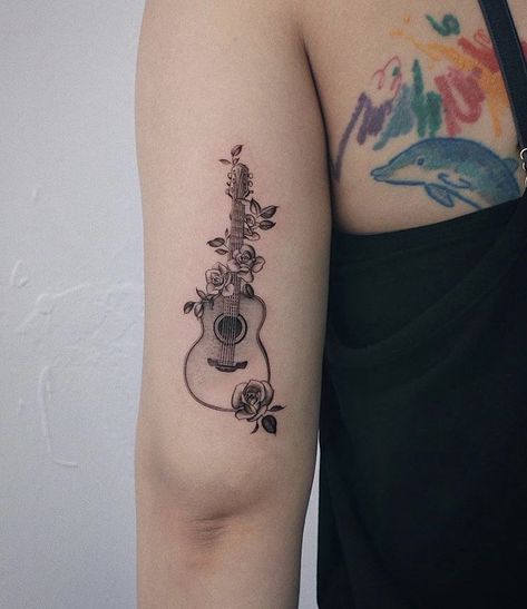 Pretty Guitar Tattoo, Acoustic Guitar With Flowers Tattoo, Rose And Guitar Tattoo, Guitar With Roses Tattoo, Guitar And Piano Tattoo, Guitar Butterfly Tattoo, Guitar Rose Tattoo, Feminine Guitar Tattoo, Feminine Music Tattoos