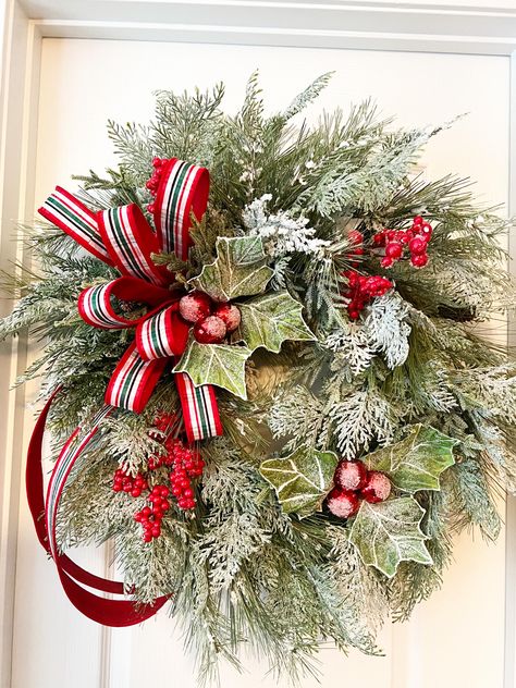 Christmas Wreath, Holly Wreath, Wreath with Holly, Wreath for Christmas, Winter Wreath, Christmas Decoration, Holiday Wreath, Door Wreath, Farmhouse Wreath Be the talk of the neighborhood with this beauty at Christmas! This wreath is made on a 16" grapevine base. Loads and loads of snow covered pine and cedar made this beauty thick and full. Iced covered red berries are perfect for this one. The two big Holly sprays with their ice covered red balls are so beautiful in this one. The extra large h Christmas Pine Wreaths, Christmas Door Decorations Diy, Christmas Buckets, Charleston Christmas, Christmas Wreath Designs, Traditional Christmas Wreath, Wreath For Christmas, Ribbon Wreaths, Booth Inspiration