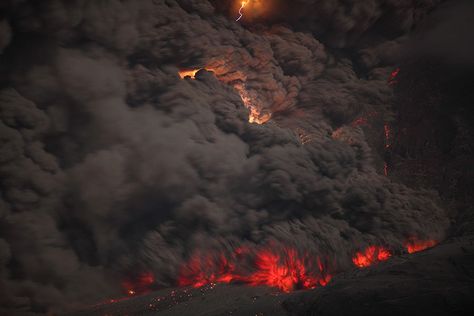 Nighttime pyroclastic flow with lightning, Sinabung volcano, 2014