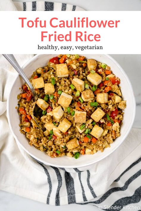 The most amazing vegetarian cauliflower fried rice with crispy tofu makes for healthy takeout at home. This healthy recipe from Slender Kitchen is MyWW SmartPoints compliant and vegetarian. #quickandeasy #sidedish #dinner Tofu Cauliflower, Healthy Takeout, Takeout At Home, Kitchen Favorites, Slender Kitchen, Cauliflower Fried, Cauliflower Rice Recipes, Rice Dinner, Veggie Meals