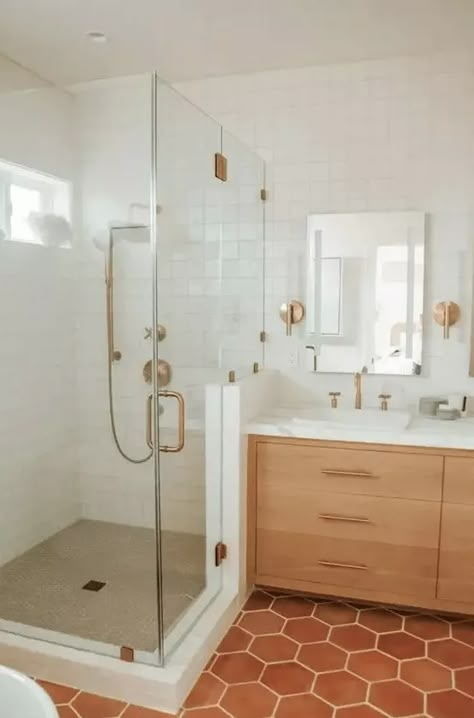 52 Warm Terracotta Tile Ideas For Bathrooms - Shelterness Kohler Harken Vanity, Blush And Cream Bathroom, Kohler Vibrant Brushed Bronze, Shower Bath Combo Remodel, Brushed Gold Shower System, Kohler Brass Bathroom Fixtures, Shower Next To Sink, Kohler Purist Bathroom Faucet, Kohler Shower System With Handheld