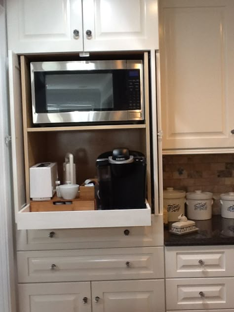 coffee station cabinet | Microwave and coffee station hidden in cabinet. Microwave Toaster, Kabinet Dapur, Home Coffee Stations, Coffee Station, Kitchen Redo, Kitchen Cabinet Design, Kitchen Remodel Idea, Cabinet Design, Home Decor Kitchen