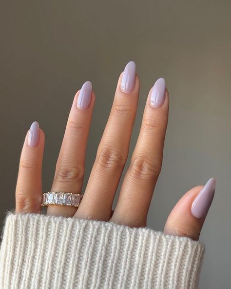 Alison • nailsbyalsn on Instagram: "i feel like THAT girl w this colour on 😙 

@gelcare.official Lavender Bb Creme | discount code: NAILSBYALSN

Ring @treasurebox.jewelry | discount code: NAILSBYALSN

*affiliate

———-
#purplenails #lavender #gelnails #minimalnails #swatch #gelcare #nudenails #almondnails #nailinspo #cutenails #sophiarichienails #winternails" Purple Nail Art Designs, Light Purple Nails, Lilac Nails, Pretty Nail Colors, Milky Nails, Lavender Nails, Minimal Nails, Nail Jewelry, Oval Nails