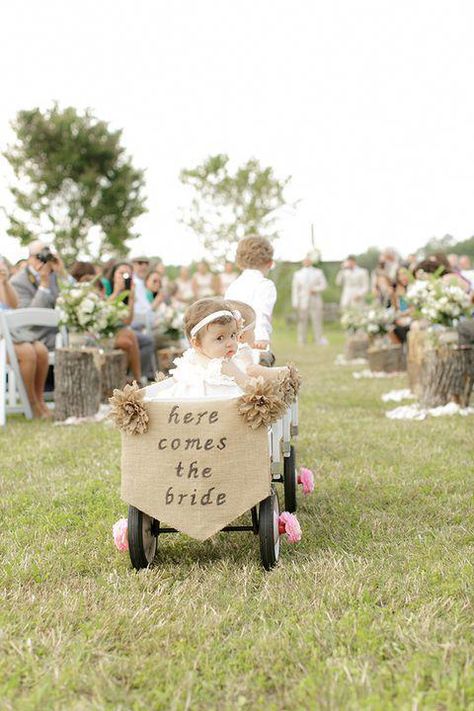 For any wedding party participants too young to walk down the aisle, enlist the help of the ring bearer to pull them in a rustic wagon.  #wedding #country #diy #countrywedding #decor #ideas #inspiration #love #glamorouswedding Flower Girl Wagon, Country Wedding Colors, Country Wedding Centerpieces, Wagon For Wedding, Country Wedding Favors, Different Wedding Ideas, Rustic Outdoor Wedding, Country Wedding Decorations, Country Wedding Dresses