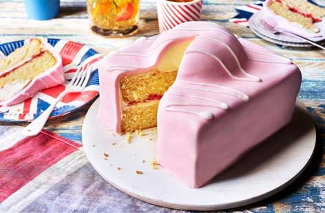 British Recipes, British Desserts, Party Platter, Tesco Real Food, Smooth Cake, Vanilla Icing, Yellow Foods, Party Platters, Fondant Icing