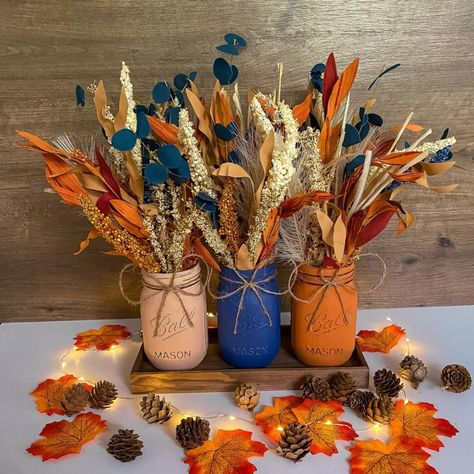 40 Mason Jar Fall Crafts Mason Jar Fall Decor, Thanksgiving Floral Arrangements, Fall Jars, Mason Jar Art, Floral Arrangement Wedding, Thanksgiving Floral, Fall Mason Jars, Fall Decor Diy Crafts, Fall Table Centerpieces