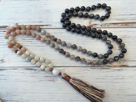 "Divine Feminine Moonstone 108 Mala, with White, Peach, Gray and Black Moonstone. For the Goddess that you are. Great for intuition, emotional balance, and to connect to your femininity. Now available in 6mm or 8mm stones, choose in drop down menu.  Details: Made with high quality White, Peach, Gray and Black Moonstone, with copper spacer beads to use as markers during meditation to help bring your focus back to your breath or intention. They are hand knotted with silk cord between each bead whi Buddha Bracelet Beads, Beads Tassels, Rose Quartz Mala, Coin Pearl Necklace, Artisan Jewelry Necklaces, Lucky Jewelry, Chakra Beads, Meditation Beads, Buddhist Prayer