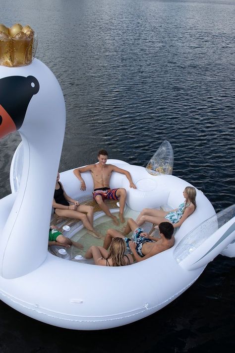 This Giant Pool Float Is 9 Feet Tall and Filled With Glitter — Winter, You Are Killing Me Floaties For The Pool, Giant Floaties, Crazy Pool Floats, Swan Pool Float, Summer Pool Floats, Cute Pool Floats, Giant Pool Floats, Giant Pool, Beach Floats