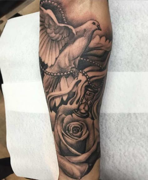 Dove Tattoos - Tattoo Insider Scroll Tattoo, Dove Tattoo Design, Half Sleeve Tattoos Forearm, Dove Tattoos, Heaven Tattoos, Dove Tattoo, Tattoos Men, Girls With Sleeve Tattoos, Forarm Tattoos