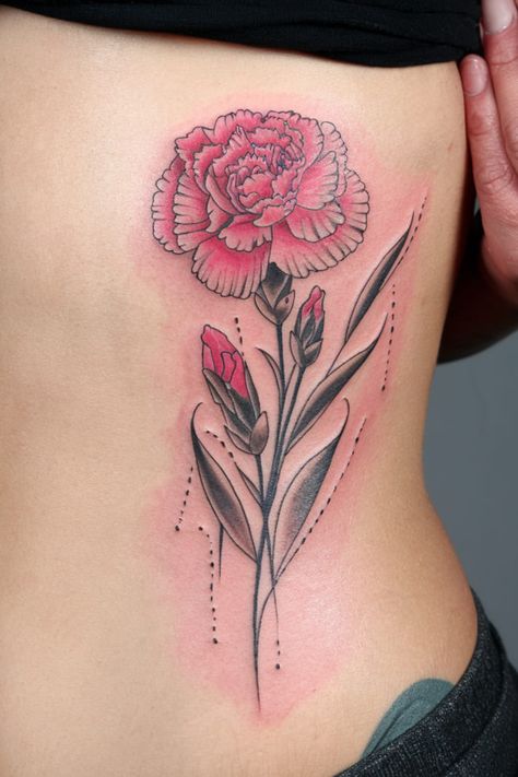 A pink carnation tattoo on the ribcage is a symbol of love, admiration, and feminine beauty. Carnations are known for their layers of delicate petals, and the pink version brings an extra layer of sweetness. Red Carnation Flower Tattoo, Rose Carnation Tattoo, Pink Carnation Tattoo, Pink Tattoo Ideas, Carnation Tattoos, Carnation Flower Tattoo, Carnation Tattoo, Pink Rose Tattoos, Tats Ideas