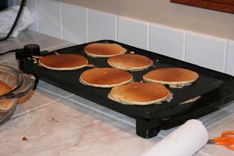 This is a German dish—pancakes with anise flavoring. Traditionally served in celebration of the new year; our family enjoys them at Christmastime. Served with bacon and sausage. Stovetop Griddle, Le Creuset Cookware, Cast Iron Griddle, Double Burner, Griddle Cooking, Bridal Registry, Tasty Kitchen, Recipe Community, Bride Magazine