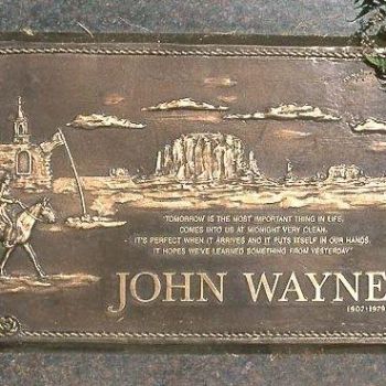 John Wayne  The actor initially requested his tombstone to read "Feo, Fuerte y Formal," meaning "ugly, strong and dignified," according to his son. Despite the request, his estate later chose to inscribe the stone with a memorable quote of Wayne. It read, "Tomorrow is the most important thing in life. Comes into us at midnight very clean. It’s perfect when it arrives and it puts itself in our hands. It hopes we’ve learned something from yesterday." Famous Tombstones, Cemetery Headstones, Famous Graves, Old Cemeteries, Cemetery Art, Julius Caesar, Important Things In Life, American Icons, After Life