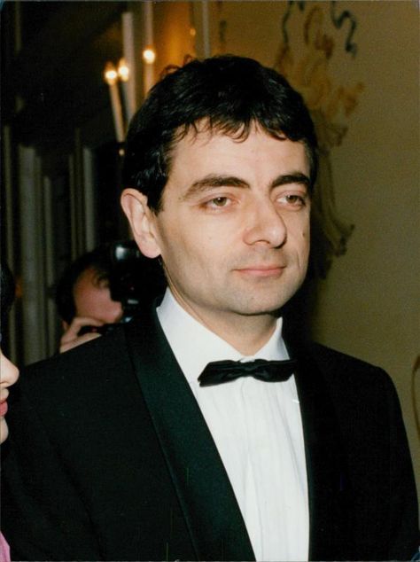 VINTAGE PHOTO of Rowan Atkinson. - $24.90. Vintage photo of Rowan Atkinson. Size of photo 5.9" x 7.9" - Id: 1101831 Rowan Sebastian Atkinson, CBE is an English actor, comedian, and screenwriter best known for his work on the sitcoms Blackadder and Mr. Bean. Optical character recognition and image recognitionText Front and back of the image: The preview images contain watermarks that are not on the delivered image, the blue logo in the bottom right is not on the original photo IMS Vi... Rowan Atkinson 90s, Rowan Atkinson, Optical Character Recognition, Mr Bean, National Treasure, Make Photo, Original Photo, Blue Logo, White Photo