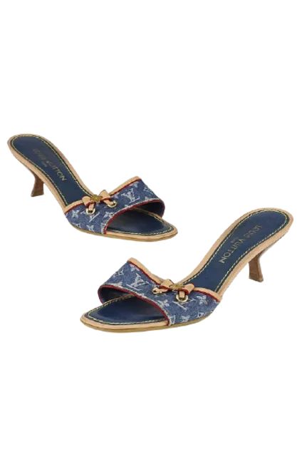 Blue denim monogram denim leather bow kitten heels .these sassy mules feature beige leather-lined blue denim uppers. decorated with a leather bow with a gold-tone louis vuitton flower and gold-tone d-rings on the ends of the ribbon. leather-padded upper and rubber sole for a comfortable fit. this is a unique style any fashionista would not want to miss! Louis Vuitton Kitten Heels, Lv Heels Louis Vuitton, Lv Heels, Dream Accessories, Louis Vuitton Heels, Denim Mules, Dream Things, Denim Heels, Shoe Decoration