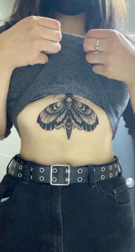 Moth On Stomach Tattoo, Witchy Tattoo Ideas Thigh, Moth Tattoo Ideas For Women, Moth Stomach Tattoos Women, Sternum Moth Tattoo Women, Upper Belly Tattoo, Moth Tattoo Underbust, Moth Tattoo On Chest, Moth Stick And Poke