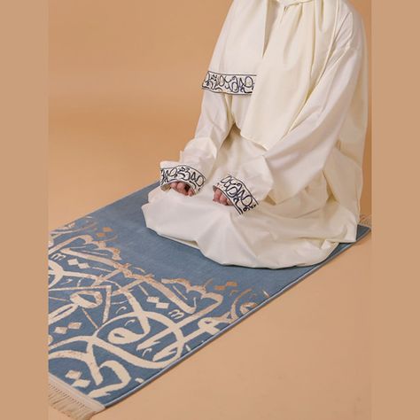 Arabic embroidered prayer dress and Carpet #Arabic #dress #Gift #Medina #prayer_dress #SilkDress #women #taswiquh Elevate your prayer experience with our exquisite Arabic embroidered prayer dress and carpet set. Crafted with intricate details, this set features a prayer rug with a mesmerizing design adorned with Arabic calligraphy letters, creating a serene and inspiring space for your prayers. https://taswiquh.com/product/arabic-embroidered-prayer-dress-and-carpet/ Arabic Calligraphy Letters, Muslim Prayer Rug, Prayer Dress, Arabic Dress, Muslim Prayer, Inspiring Spaces, Calligraphy Letters, Prayer Rug, A Prayer