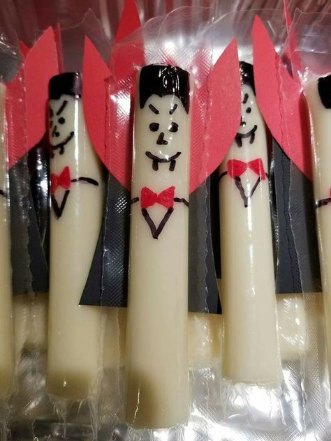 Vampire Snacks Food Ideas, Halloween Cheese Sticks, Vampire Snack Ideas, Halloween Cheesesticks, Ghost Cheese Sticks, Vampire Theme Snacks, Halloween String Cheese Ideas, String Cheese Ghost, Vampire Snacks