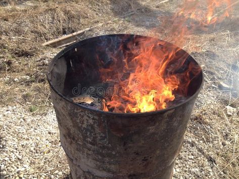 A metal barrel with lit trash burning with a bright flame. Garbage burns in a ba #Sponsored , #Paid, #paid, #lit, #metal, #burning, #trash Metal Barrel, Spotify Covers, A Metal, Fire Pit, Barrel, Stock Images, Wallpapers, Illustrations, Quick Saves