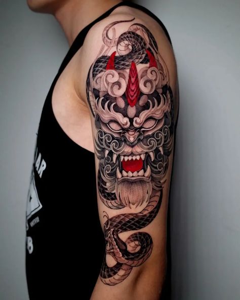 33 Captivating Half-Sleeve Tattoos for Men in 2024 Sleeve Tattoos Ideas, Meaning Art, Foo Dog Tattoo, Dog Tattoo Ideas, Zeus Tattoo, Half Sleeve Tattoos, King Tattoos, Half Sleeve Tattoos For Guys, Upper Arm Tattoos